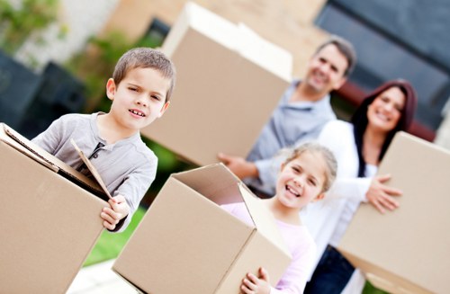 Furniture being carefully loaded into a moving van