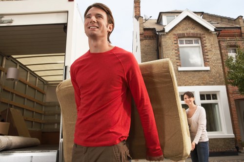 Careful loading of household items by a moving crew