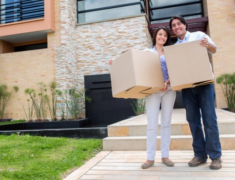 Loading household items into a van for a New Addington move